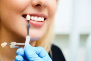 close up cropped image of woman getting a porcelain veneer consultation cosmetic dentistry dentist in Hendersonville North Carolina